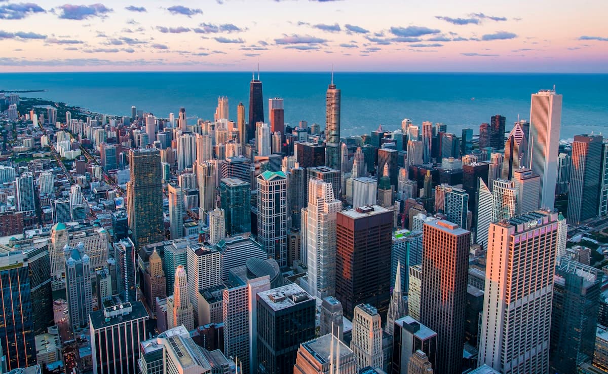 The Chicago skyline at dusk with Lake Michigan in the background